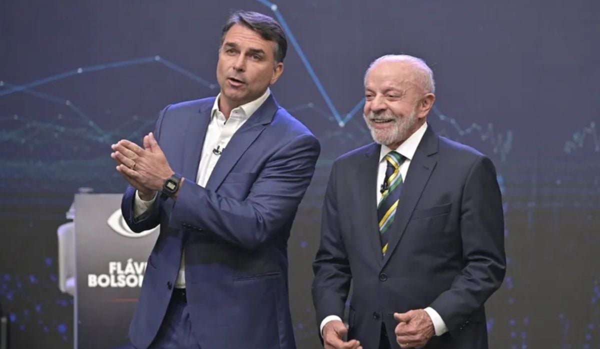 Flávio e Lula se enfrentam durante o debate da Band