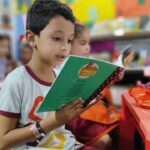PfRsJL1A-crianca-lendo