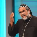 xagWzbaz-Padre-Kelmon-jpg