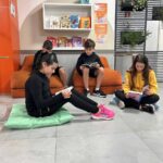 Criancas-lendo-Foto-Divulgacao-Colegio-Positivo