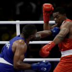 Abner-Teixeira-em-acao-contra-o-equatoriano-Gerlon-Congo-pelas-oitavas-de-final-do-boxe-masculino-categoria-peso-super-pesado-acima-de-92kg